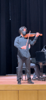Andrei playing violin