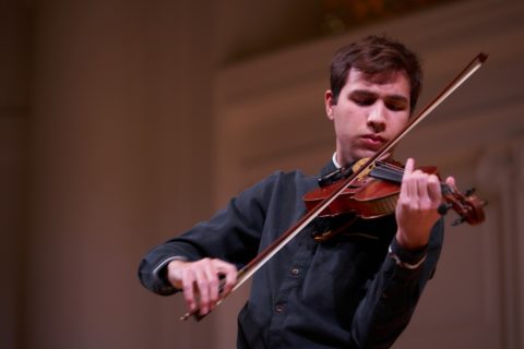 Sameer performing violin